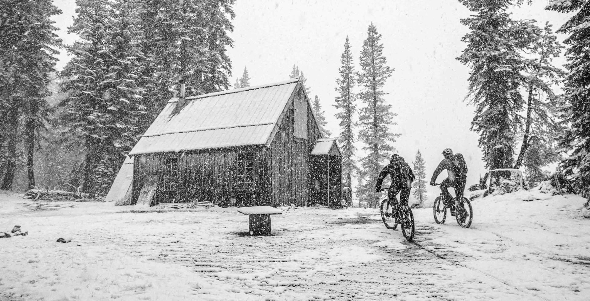 Nothing beats a warm fire and hot meal after a long, cold ride. Eric Porter and Kurt Gensheimer pedal out of a September snowstorm, eager to arrive at the evening’s accommodations.