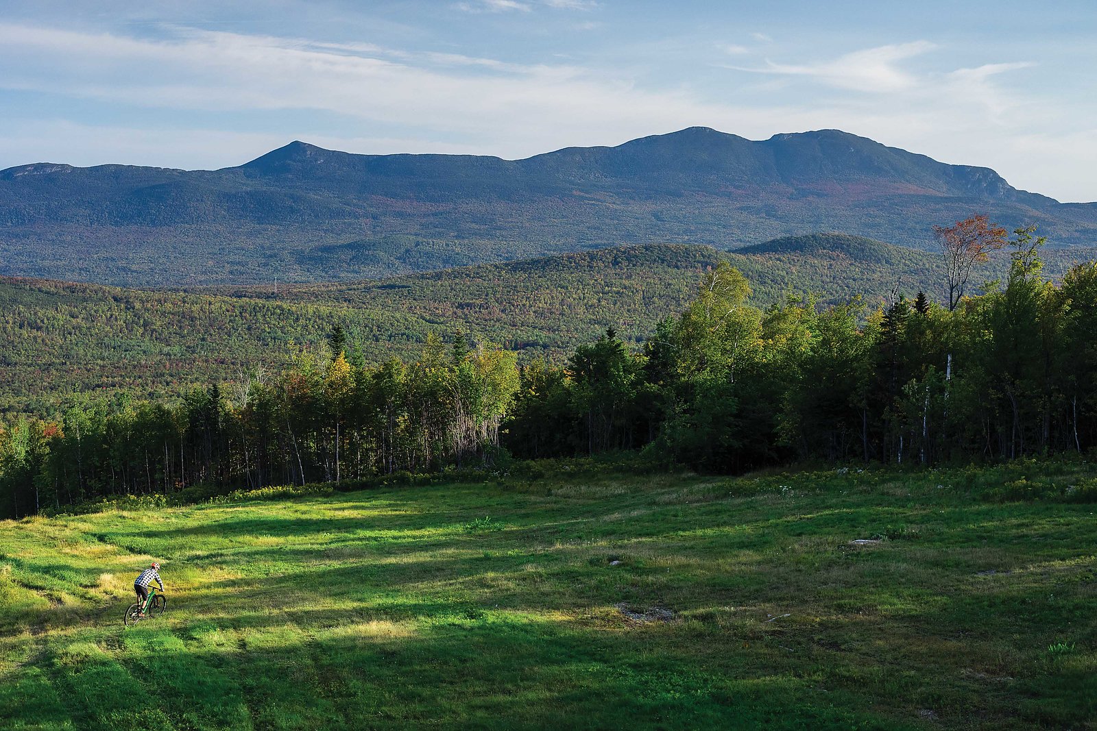 From The Ground Up Trail Goddesses And Sweat Equity In - drops into the west knoll trail just after sunrise with bigelow mountain serving as an impressive backdrop over the north side of carrabassett valley