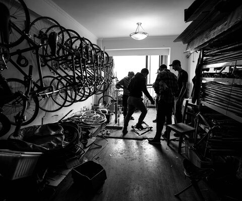 Abu Ren tests a frame at Simple Bikes’ headquarters— as well as their warehouse and factory—in a small room on the 11th floor of an apartment complex in Chengdu, China.