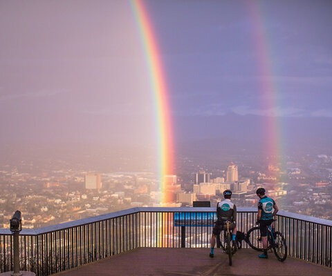 Gordon Wadsworth and Andrew Dunlap pause to take in a wild view of Roanoke from the Mill Mountain Lookout. Being minutes from town, Mill Mountain is the perfect place for a quick ride—although epic double rainbow views can’t always be expected.