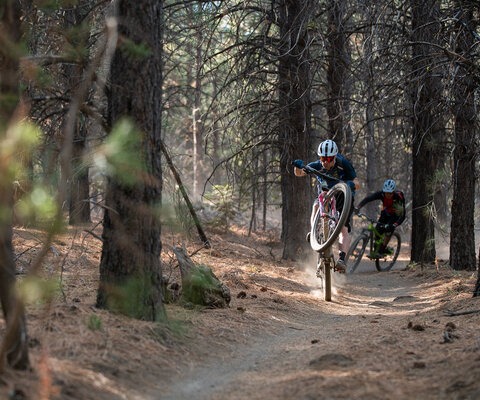 The way Kirt rides, he's more likely to have at least one wheel off the ground than two on it. A high-speed manual followed by his good friend Russ Risdon at home in Bend, OR. Photo: Jann Eberharter