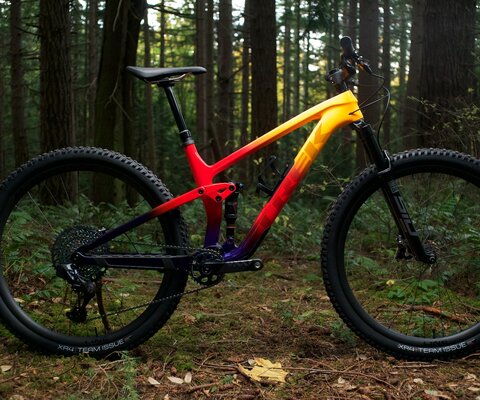Marigold to Red to Purple Abyss Fade colorway on the Trek Top Fuel.